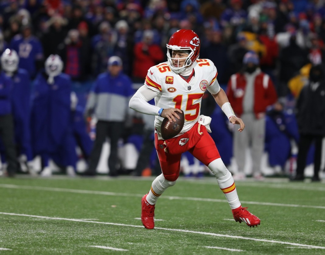 Chiefs quarterback Patrick Mahomes has an open area to move about as he looks for a receiver during the first half of the Bills divisional game against Kansas City Chiefs at Highmark Stadium