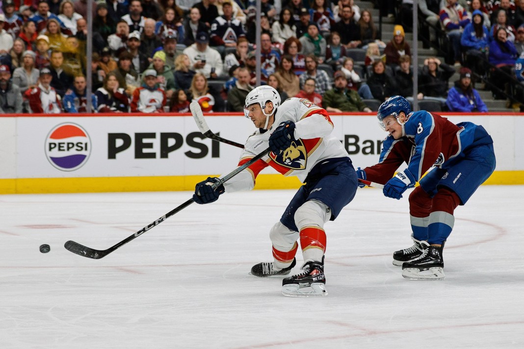 Florida Panthers center Sam Reinhart scores on a breakaway ahead of Colorado Avalanche defenseman Cale Makar.