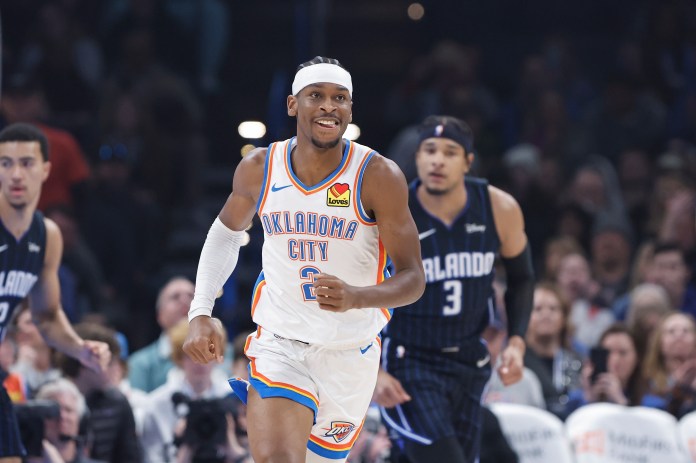 Oklahoma City Thunder guard Shai Gilgeous-Alexander (2) smiles after scoring against the Orlando Magic during the first quarter at Paycom Center