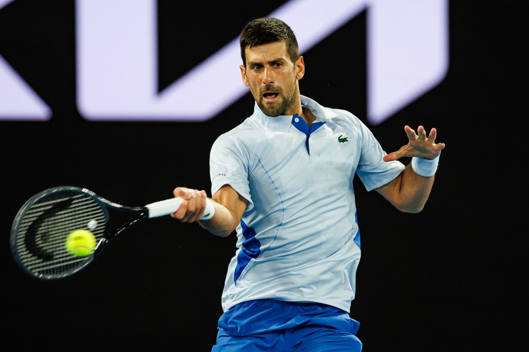 ovak Djokovic of Serbia hits a shot against Dino Prizmic of Croatia in the first round of the men's singles