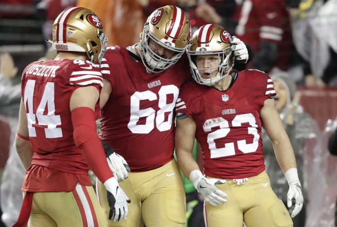 San Francisco 49ers running back Christian McCaffrey (23) celebrates scoring a touchdown in the third quarter with fullback Kyle Juszczyk (44)