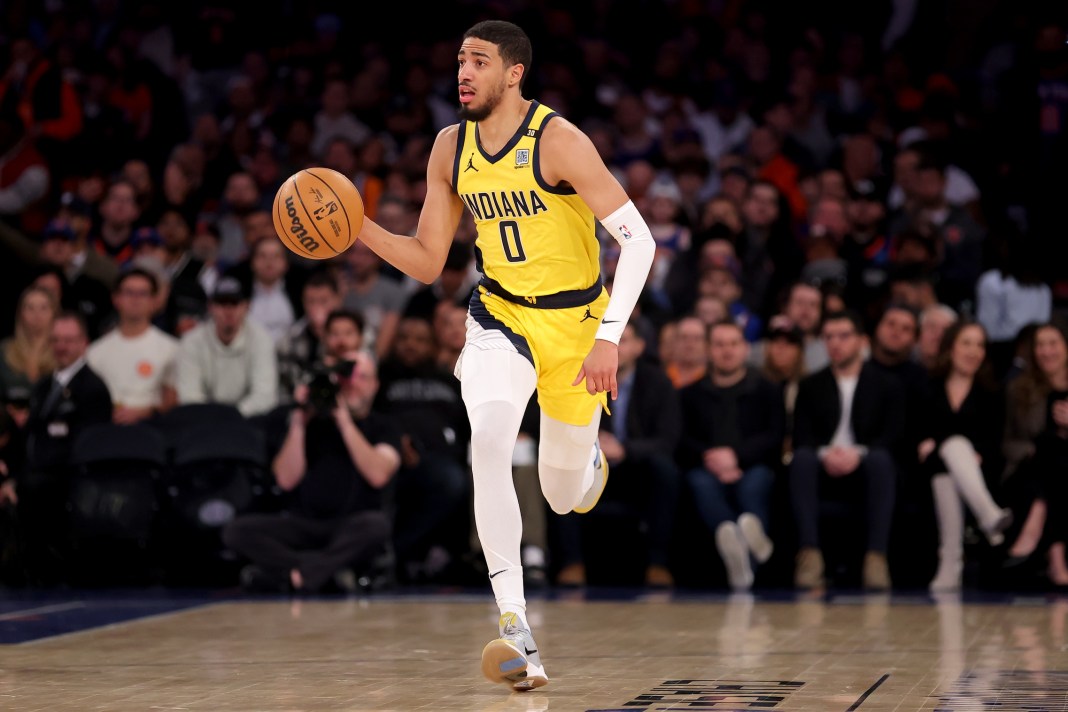 Indiana Pacers guard Tyrese Haliburton brings the ball up court against the New York Knicks in the first quarter.