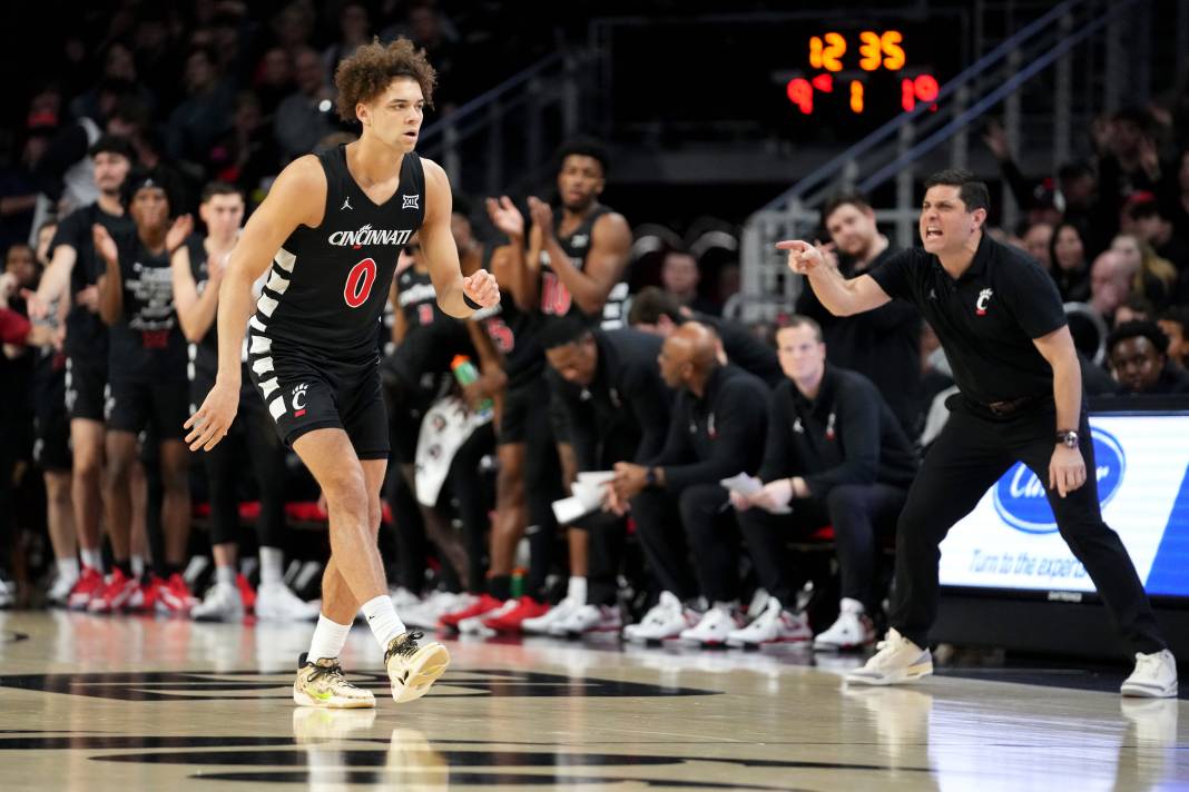 Cincinnati Bearcats guard Dan Skillings Jr. returns to defend after scoring a 3-point basket during a NCAA college basketball game..