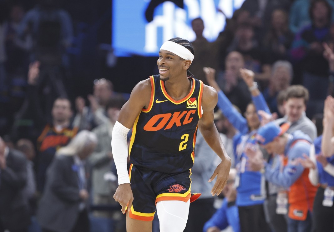 Oklahoma City Thunder guard Shai Gilgeous-Alexander smiles after scoring against the Sacramento Kings.