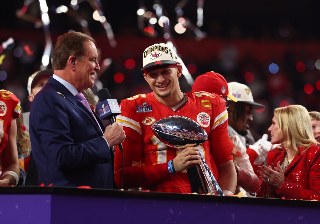 Kansas City Chiefs quarterback Patrick Mahomes (15) celebrates with the Vince Lombardi Trophy after defeating the San Francisco 49ers in Super Bowl LVIII at Allegiant Stadium