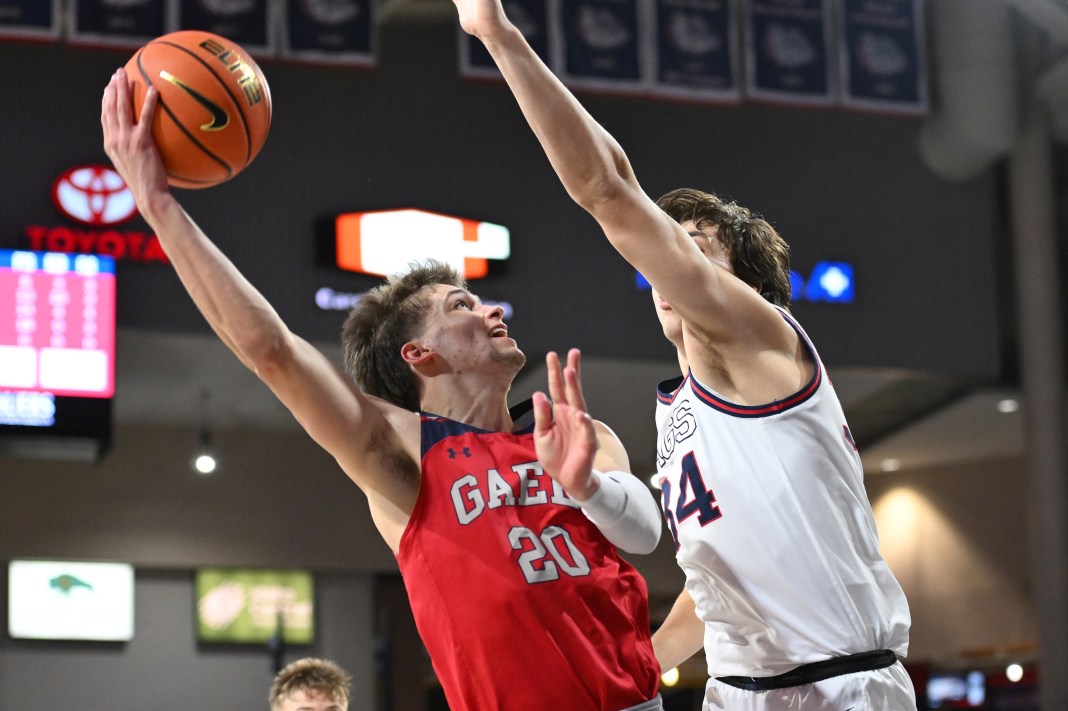 St. Mary's Gaels guard Aidan Mahaney (20) shoots the ball against Gonzaga Bulldogs forward Braden Huff (34) in the second half at McCarthey Athletic Center