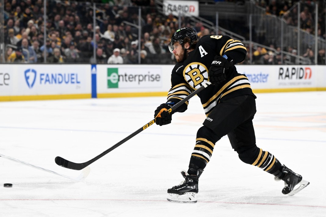 Boston Bruins right wing David Pastrnak takes a shot against the Seattle Kraken during the first period at TD Garden.