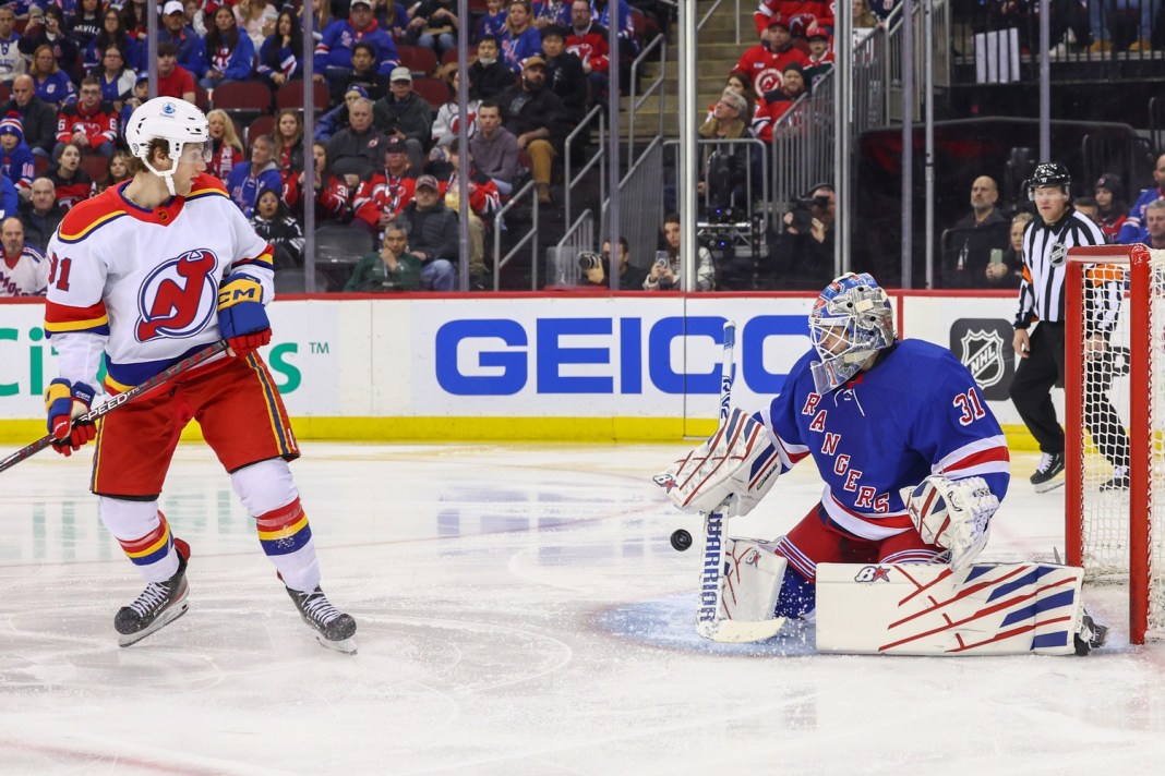 New York Rangers goaltender Igor Shesterkin makes a save against the New Jersey Devils during the second period at Prudential Center.