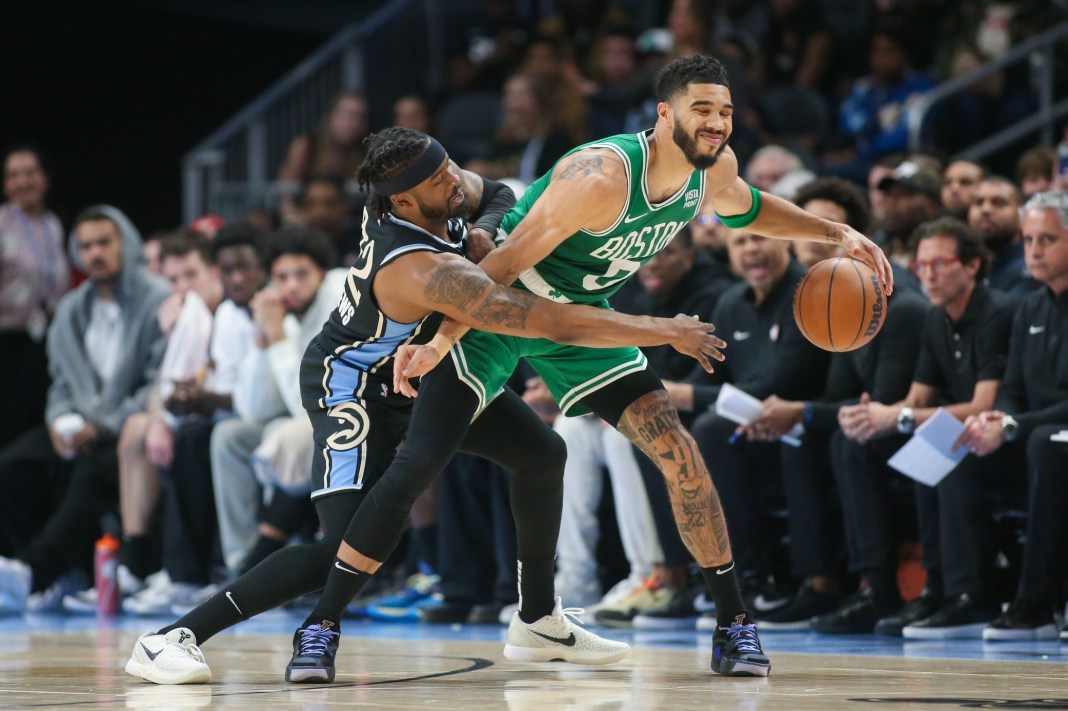 Atlanta Hawks guard Wesley Matthews defends Boston Celtics forward Jayson Tatum in the second half at State Farm Arena.