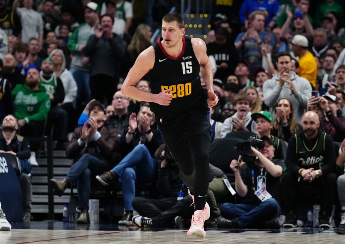 Denver Nuggets center Nikola Jokic following his score in the second half against the Boston Celtics at Ball Arena.