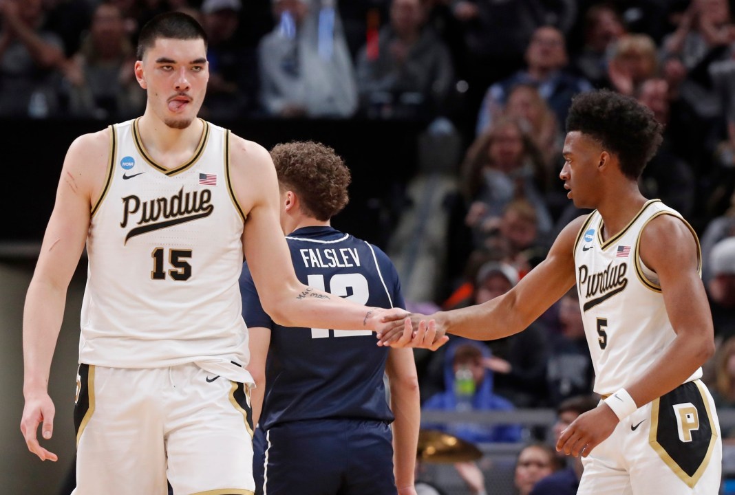 Purdue Boilermakers center Zach Edey high-fives Purdue Boilermakers guard Myles Colvin during NCAA Men's Basketball Tournament game.