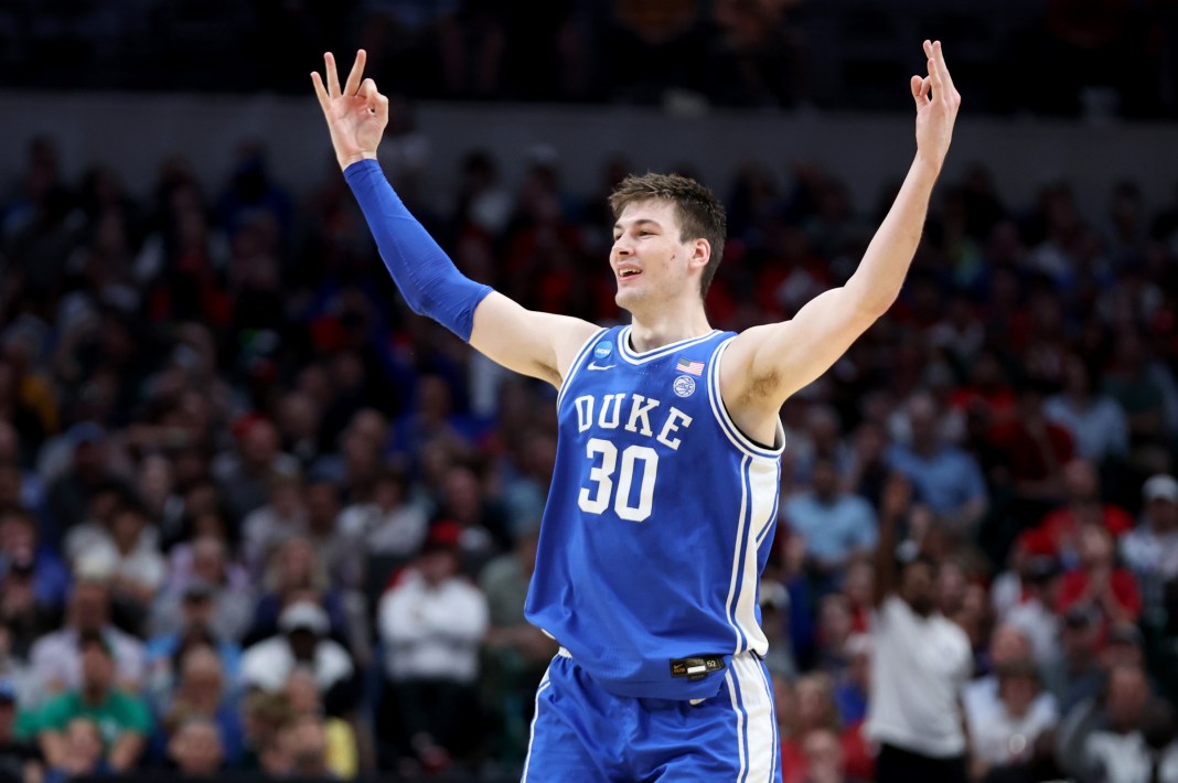 Duke Blue Devils center Kyle Filipowski reacts after a basket in the semifinals of the South Regional of the 2024 NCAA Tournament.