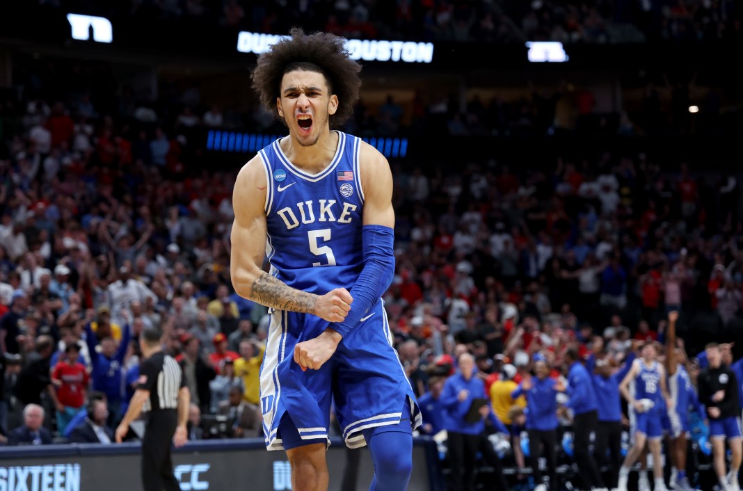 Duke Blue Devils guard Tyrese Proctor (5) reacts after defeating the Houston Cougars in the semifinals of the South Regional of the 2024 NCAA Tournament at American Airlines Center