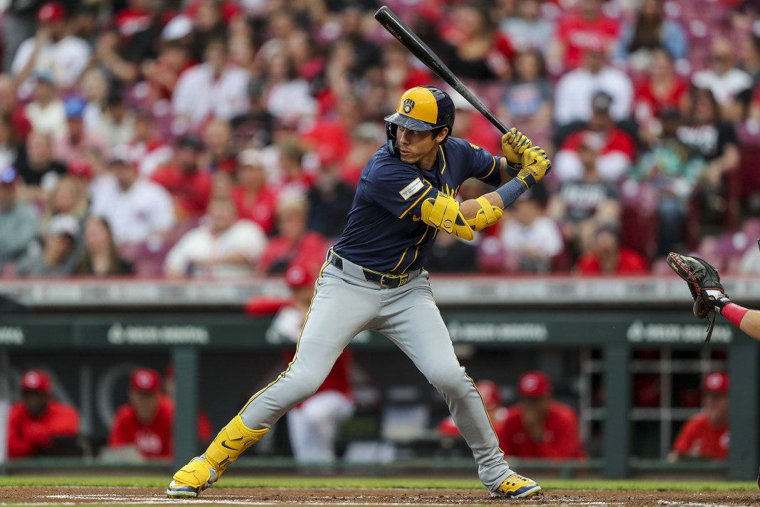 Milwaukee Brewers outfielder Christian Yelich bats against the Cincinnati Reds in the first inning at Great American Ball Park.