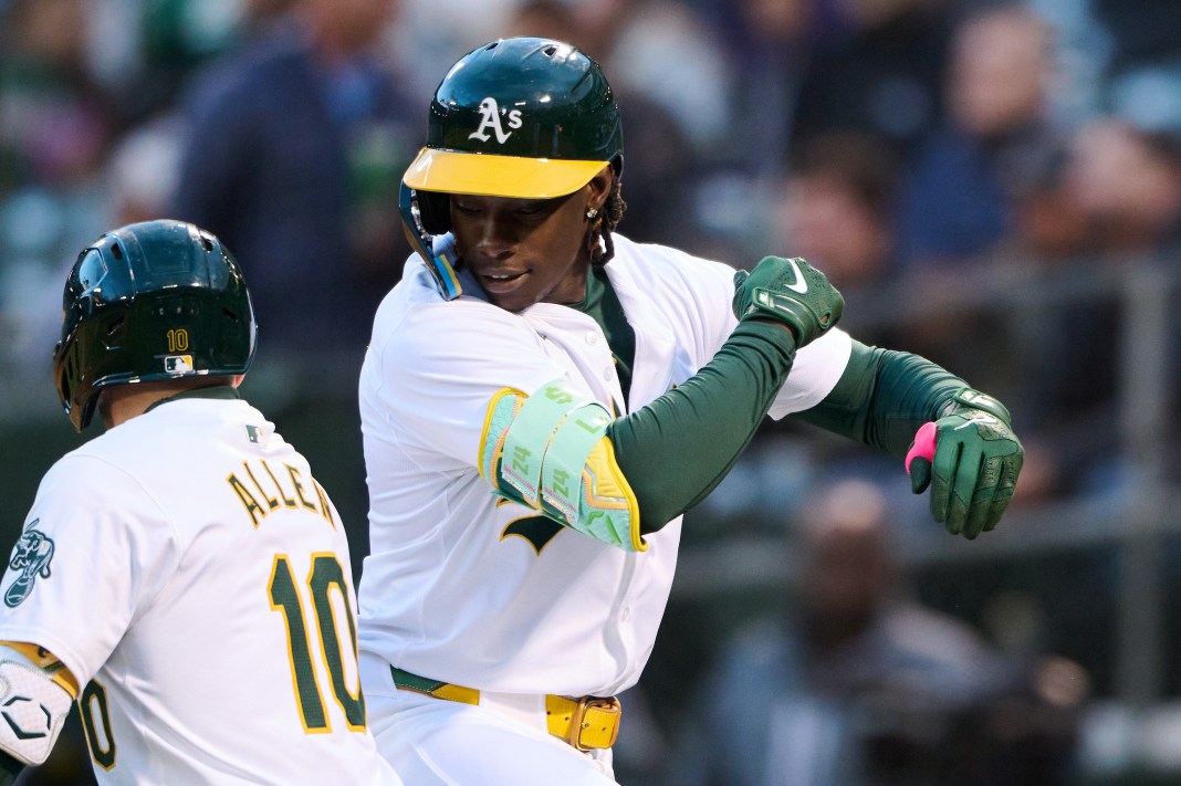 Oakland Athletics outfielder Lawrence Butler celebrates with shortstop Nick Allen after hitting a home run against the Washington Nationals.