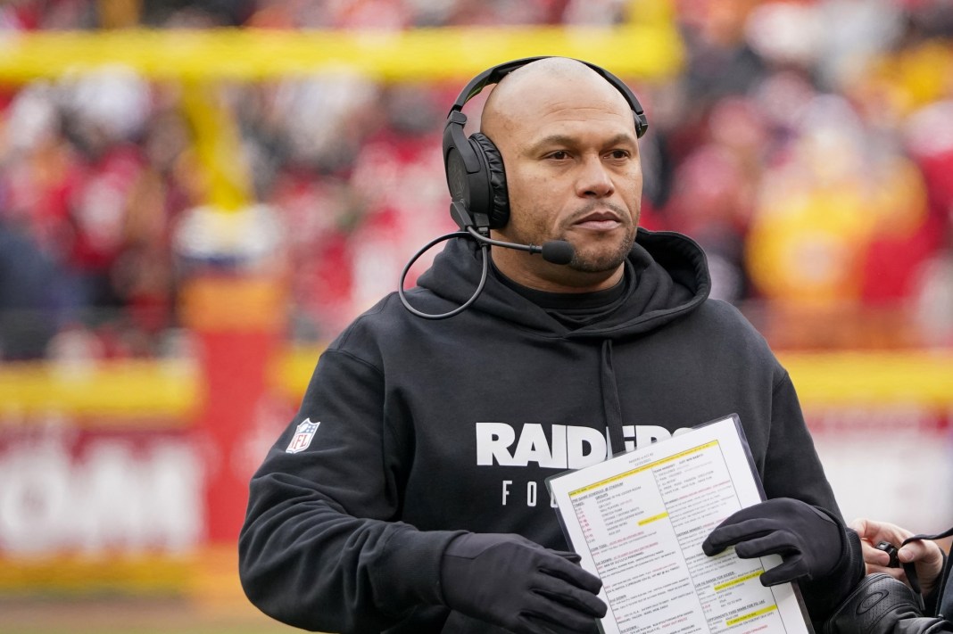 Las Vegas Raiders interim head coach Antonio Pierce on field against the Kansas City Chiefs during the first half at GEHA Field at Arrowhead Stadium