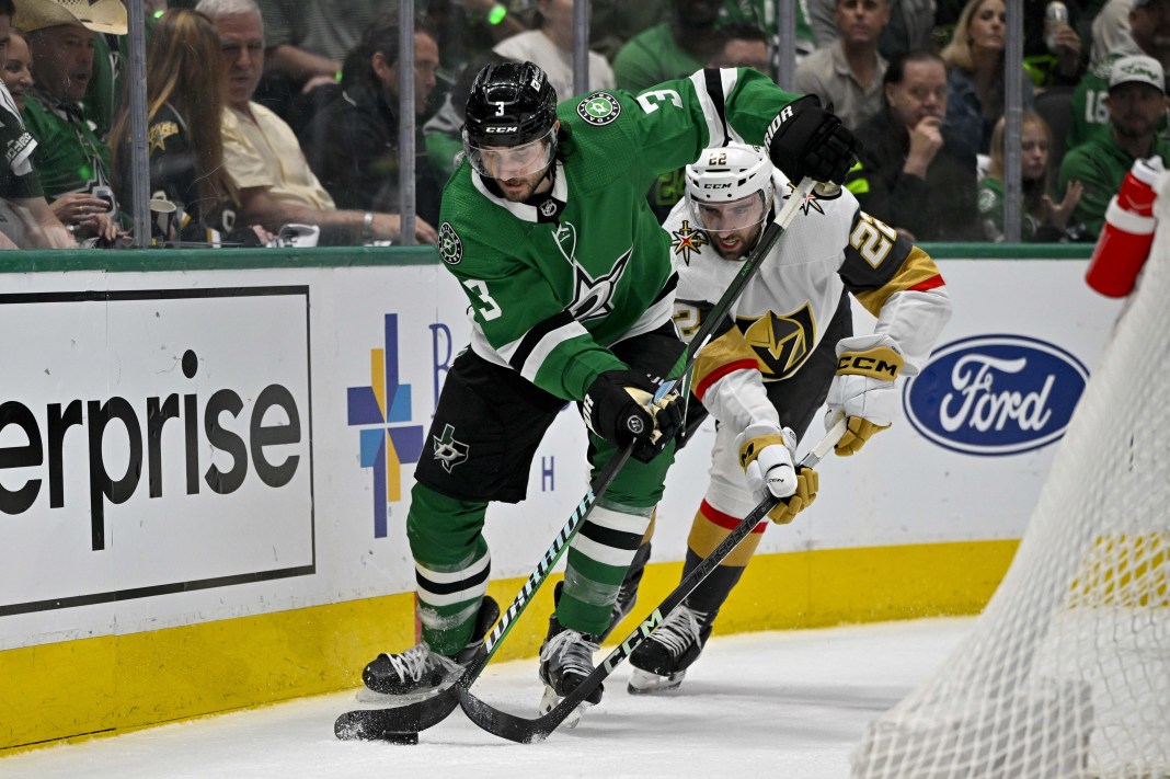 Dallas Stars defenseman Chris Tanev and Vegas Golden Knights right wing Michael Amadio chase the puck during the 2024 Stanley Cup Playoffs.