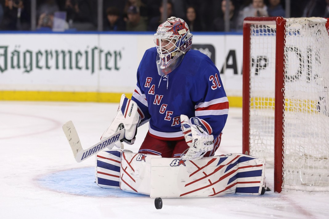 New York Rangers goaltender Igor Shesterkin makes a save against the Carolina Hurricanes in game five of the 2024 Stanley Cup Playoffs.