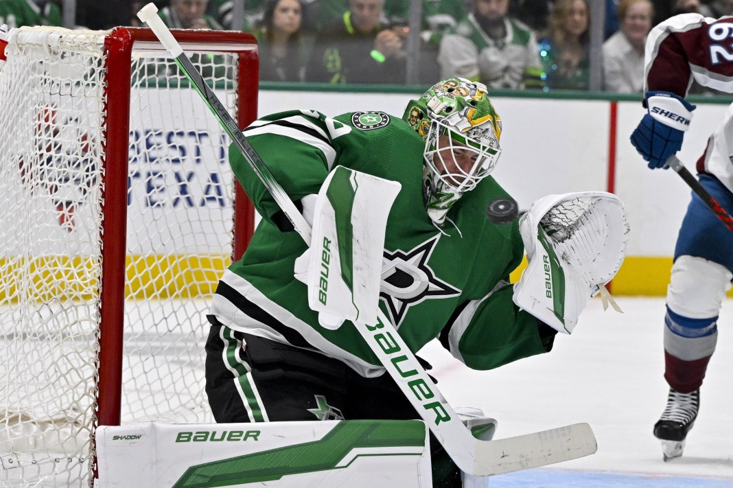 Dallas Stars goaltender Jake Oettinger (29) makes a save on a Colorado Avalanche shot during the third period in game five of the second round of the 2024 Stanley Cup Playoffs