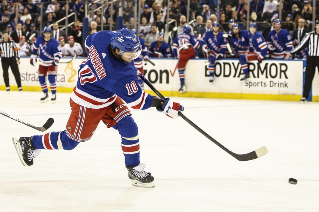 New York Rangers left wing Artemi Panarin attempts a shot on goal against the Carolina Hurricanes in the 2024 Stanley Cup Playoffs.