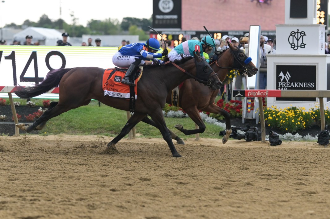 National Treasure with John R. Velazquez up (1) defeats Blazing Sevens with Irad Ortiz, Jr. up (7) to win the 148th running of the Preakness Stakes at Pimlico Race Course