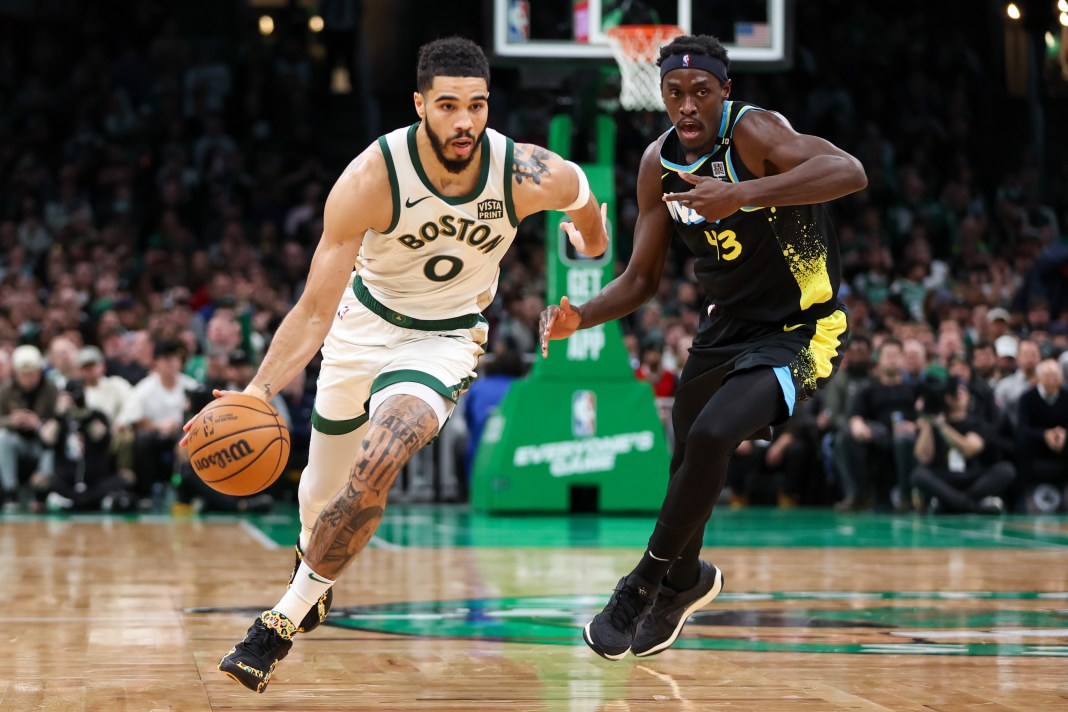 Boston Celtics forward Jayson Tatum drives to the basket during the second half against the Indiana Pacers at TD Garden.