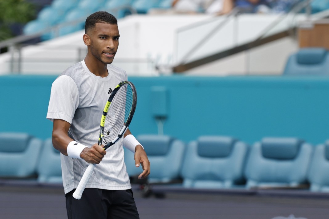 Felix Auger-Aliassime celebrates a big win at the Miami Open.