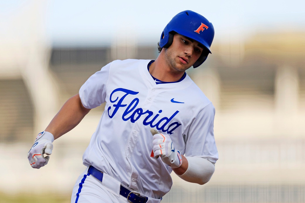 Florida utility Jac Caglianone rounds third base after hitting a home run during an NCAA baseball matchup.