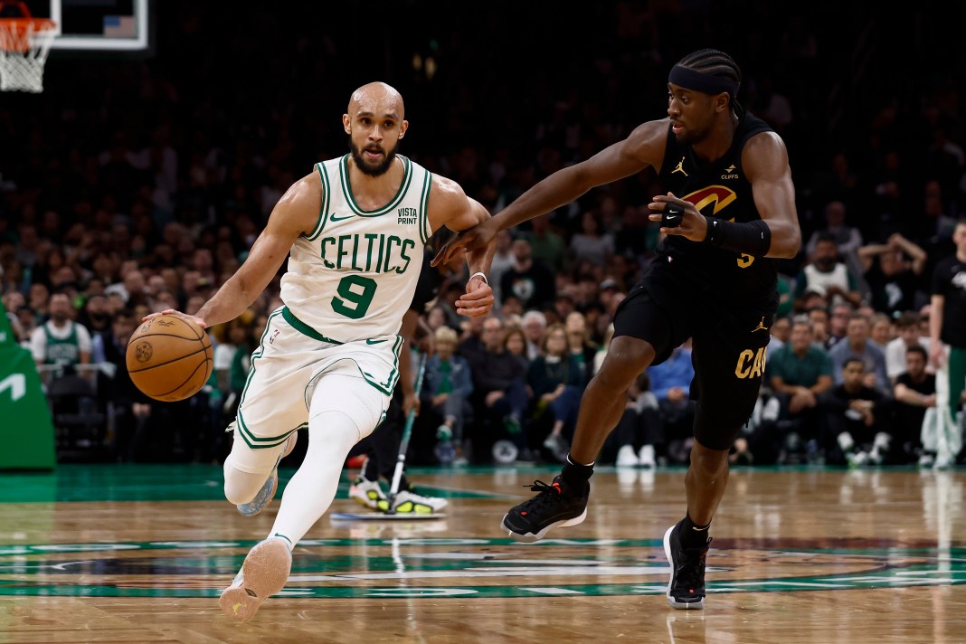 Boston Celtics guard Derrick White (9) drives on Cleveland Cavaliers guard Caris LeVert (3) during the third quarter of game one of the second round of the 2024 NBA playoffs at TD Garden