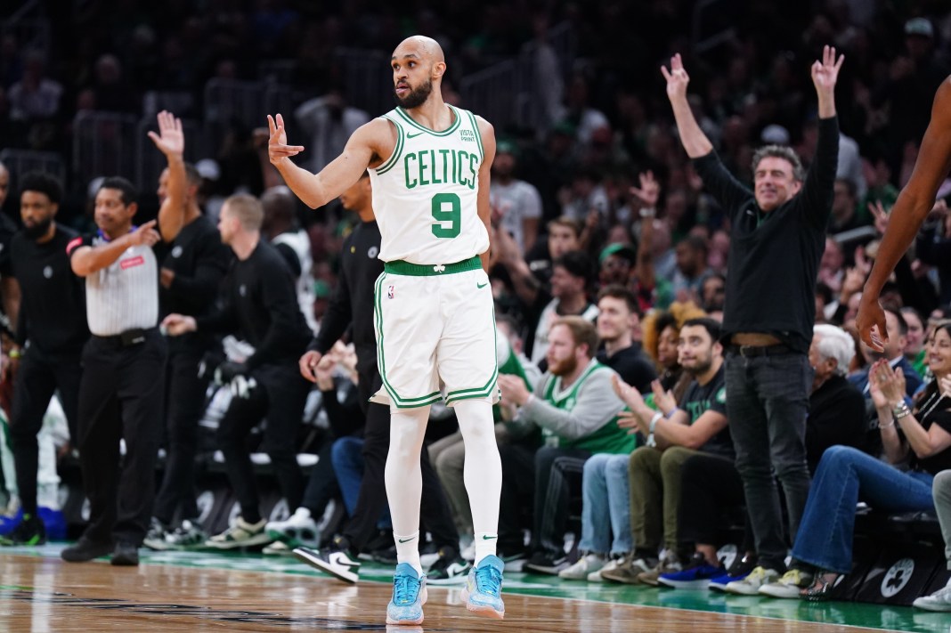 Celtics guard Derrick White reacts after his three-pointer against the Cavaliers in the 2024 NBA playoffs.