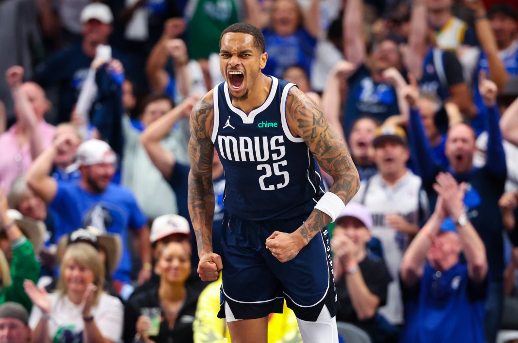 Dallas Mavericks forward P.J. Washington (25) reacts after dunking during the second half against the Oklahoma City Thunder