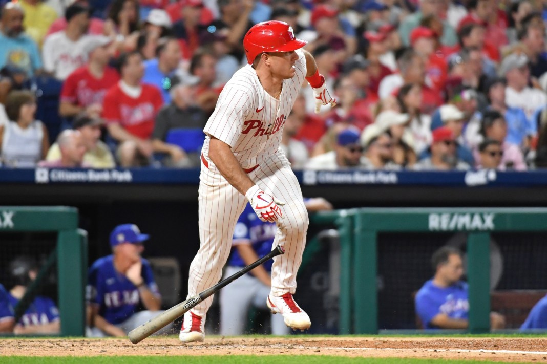 Philadelphia Phillies star J.T. Realmuto runs to first base after a two-RBI single against the Texas Rangers.