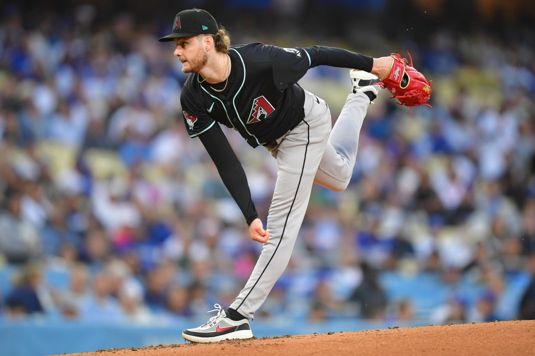 ryne nelson throws a pitch