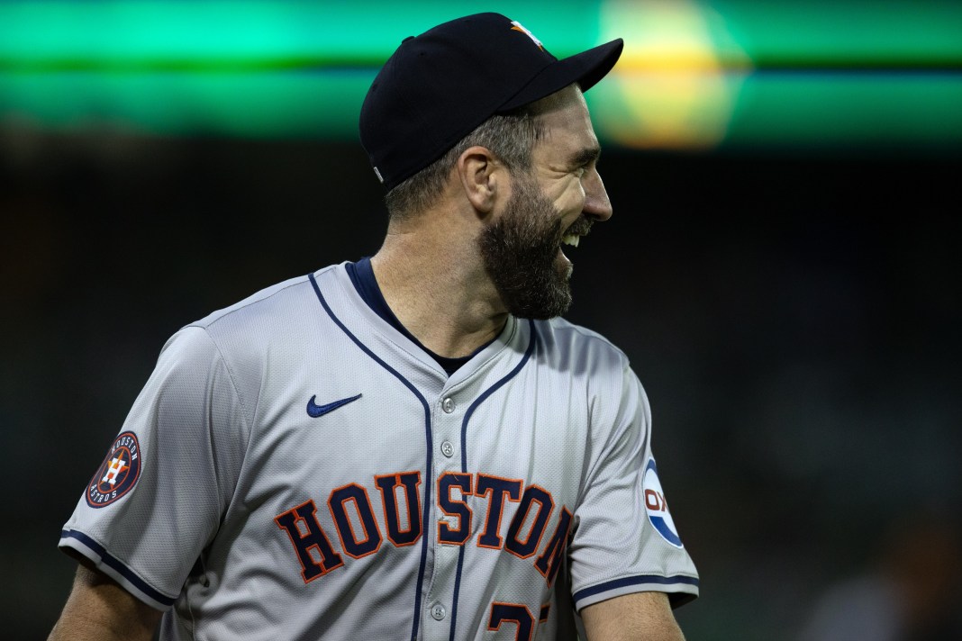 Houston Astros ace Justin Verlander smiles as he walks off the mound in a start against the Oakland Athletics.