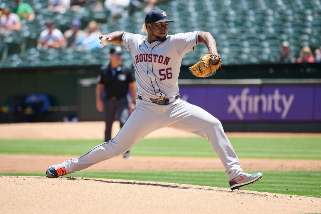 ronel blanco throws a pitch