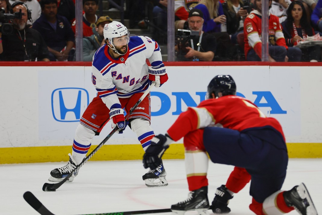 New York Rangers center Vincent Trocheck (16) moves the puck against the Florida Panthers during the first period in game four of the Eastern Conference Final of the 2024 Stanley Cup Playoffs