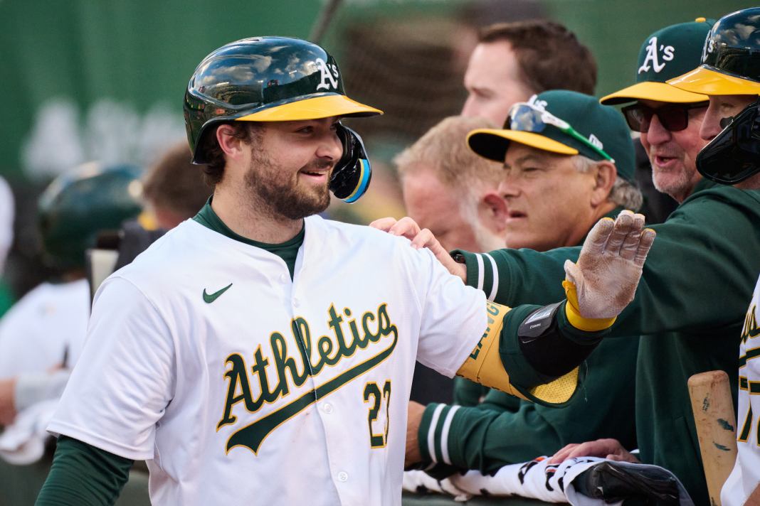 Oakland Athletics catcher Shea Langeliers celebrates after hitting a three-run home run against the Miami Marlins during the eighth inning at Oakland-Alameda County Coliseum.