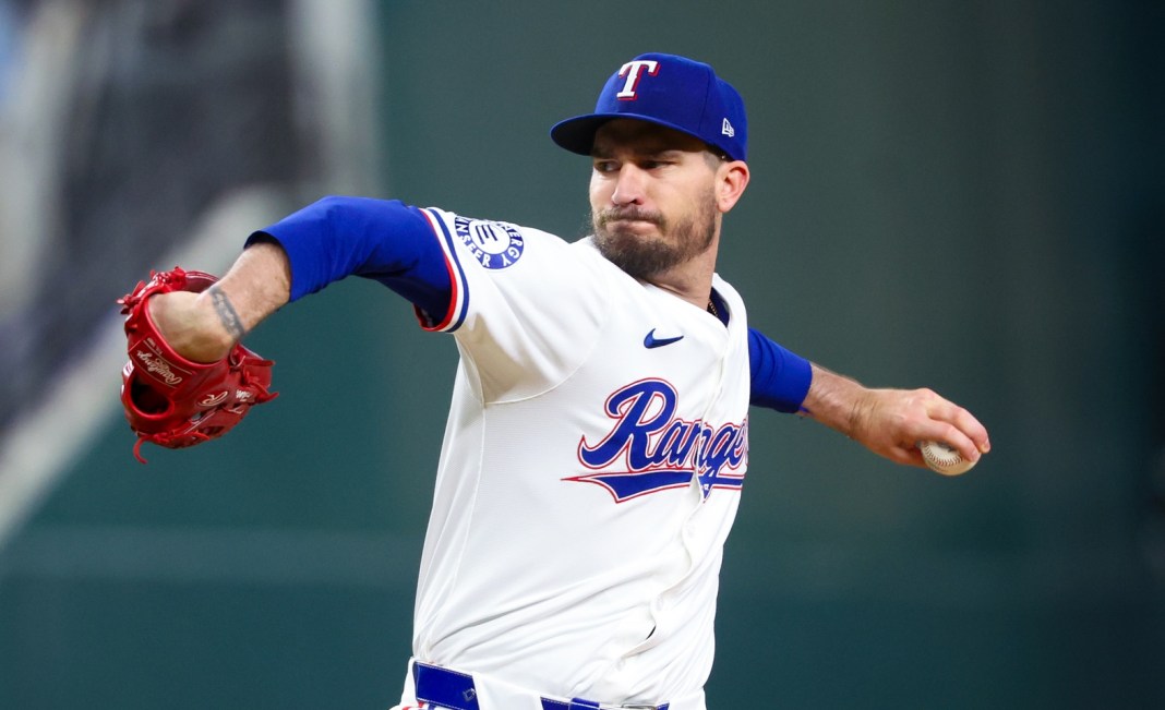 Texas Rangers starting pitcher Andrew Heaney (44) throws during the first inning against the New York Mets at Globe Life Field