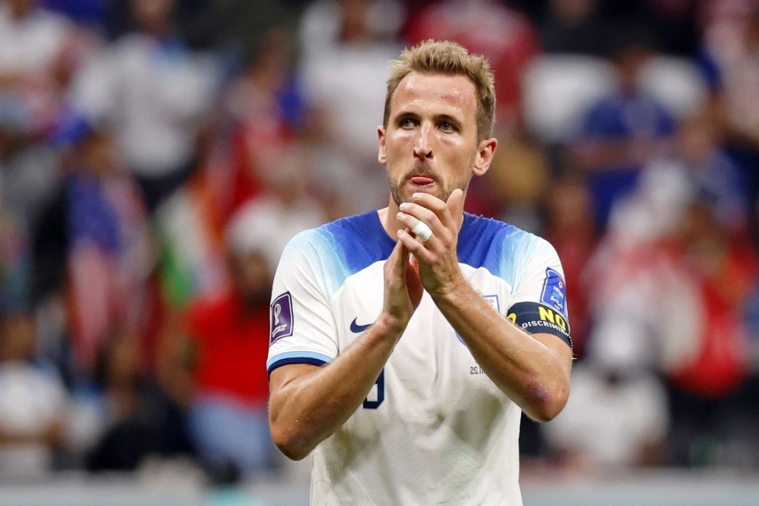 England forward Harry Kane acknowledges fans after a group stage match against the USA in the 2022 World Cup.