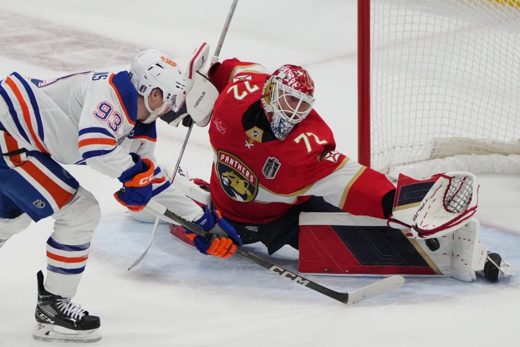 Edmonton Oilers forward Ryan Nugent-Hopkins shoots the puck against Florida Panthers goaltender Sergei Bobrovsky.