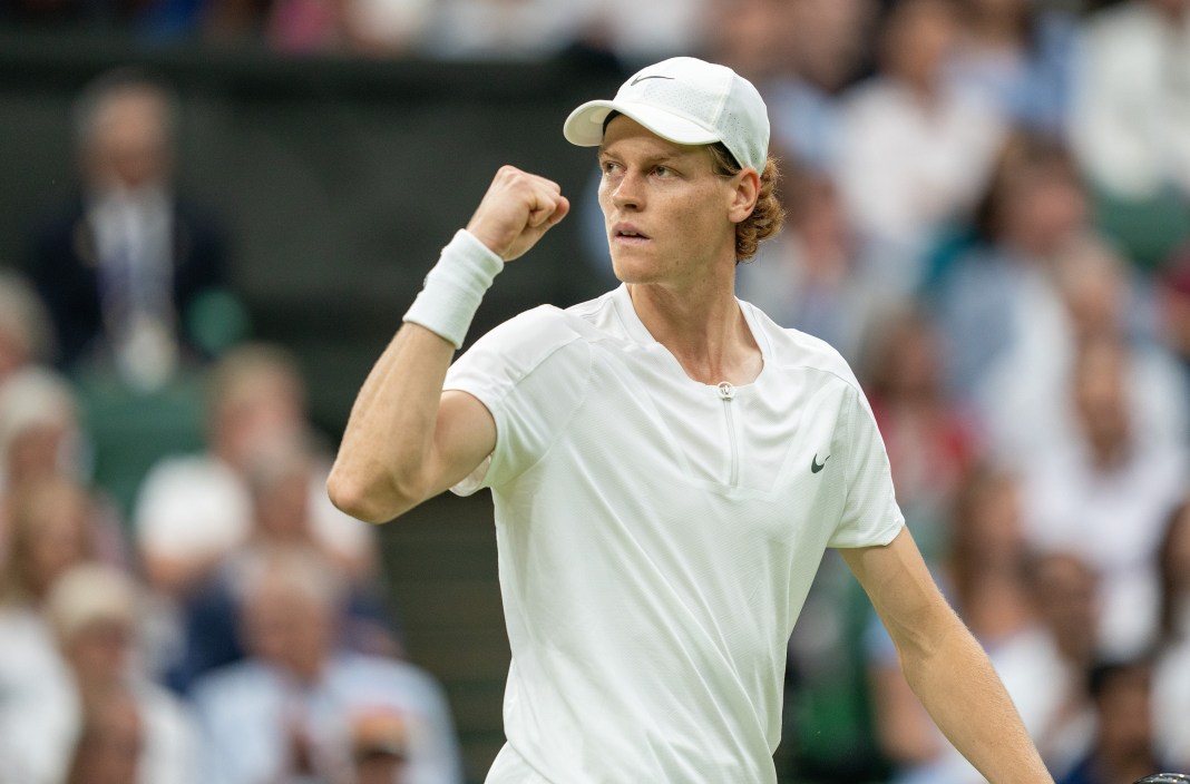 Jannik Sinner celebrates a big point won against Novak Djokovic at Wimbledon in 2023.