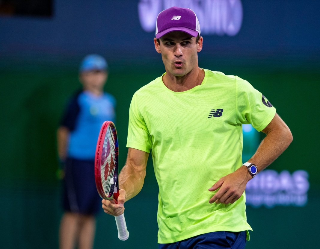 Tommy Paul celebrates winning a point against Daniil Medvedev at Indian Wells.