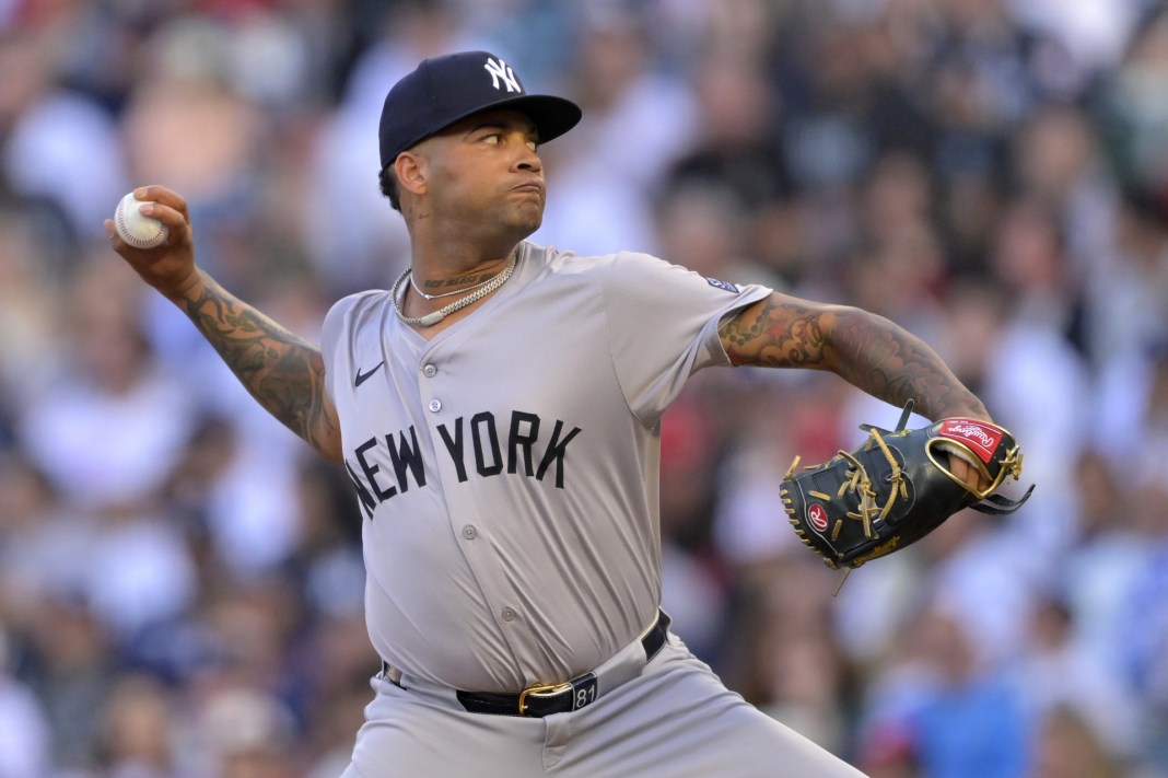 New York Yankees starting pitcher Luis Gil throws a pitch against the Los Angeles Angels.