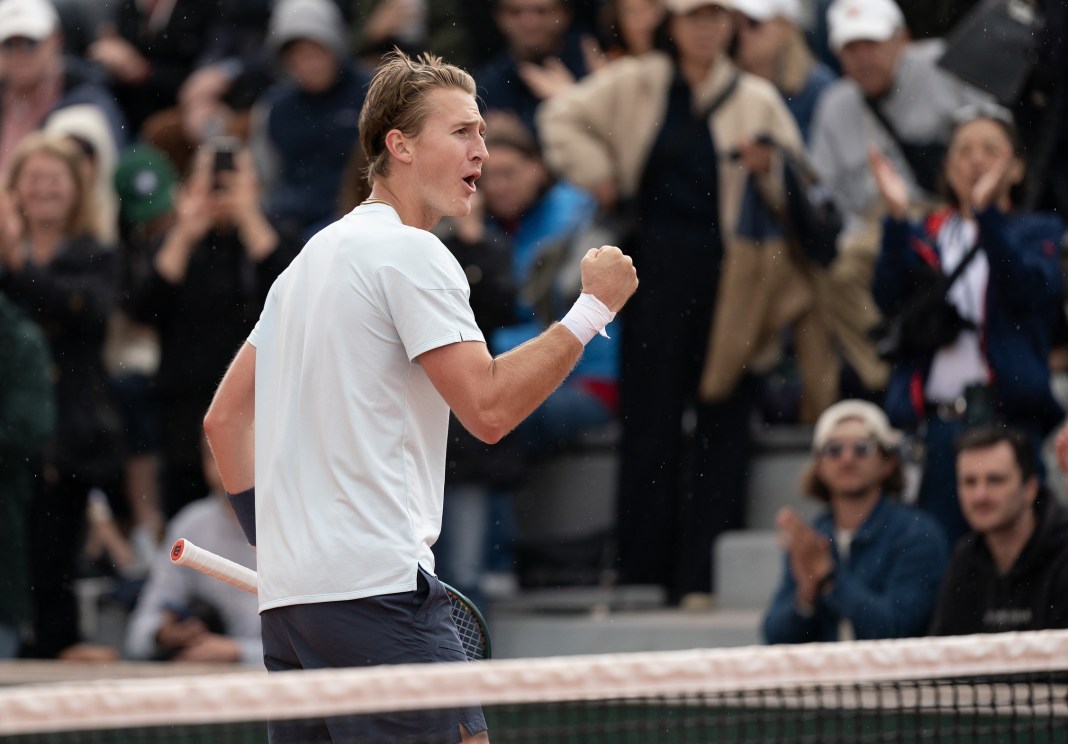 Sebastian Korda celebrates a win over Soonwoo Kwon at the French Open.