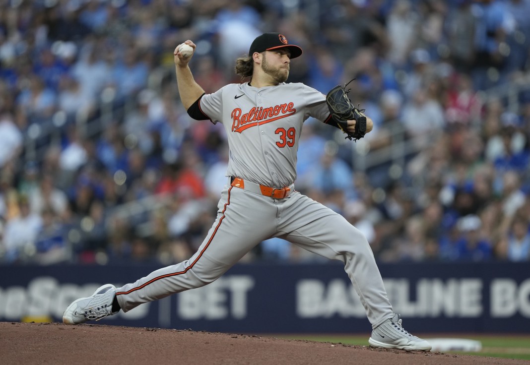 corbin burnes throws a pitch