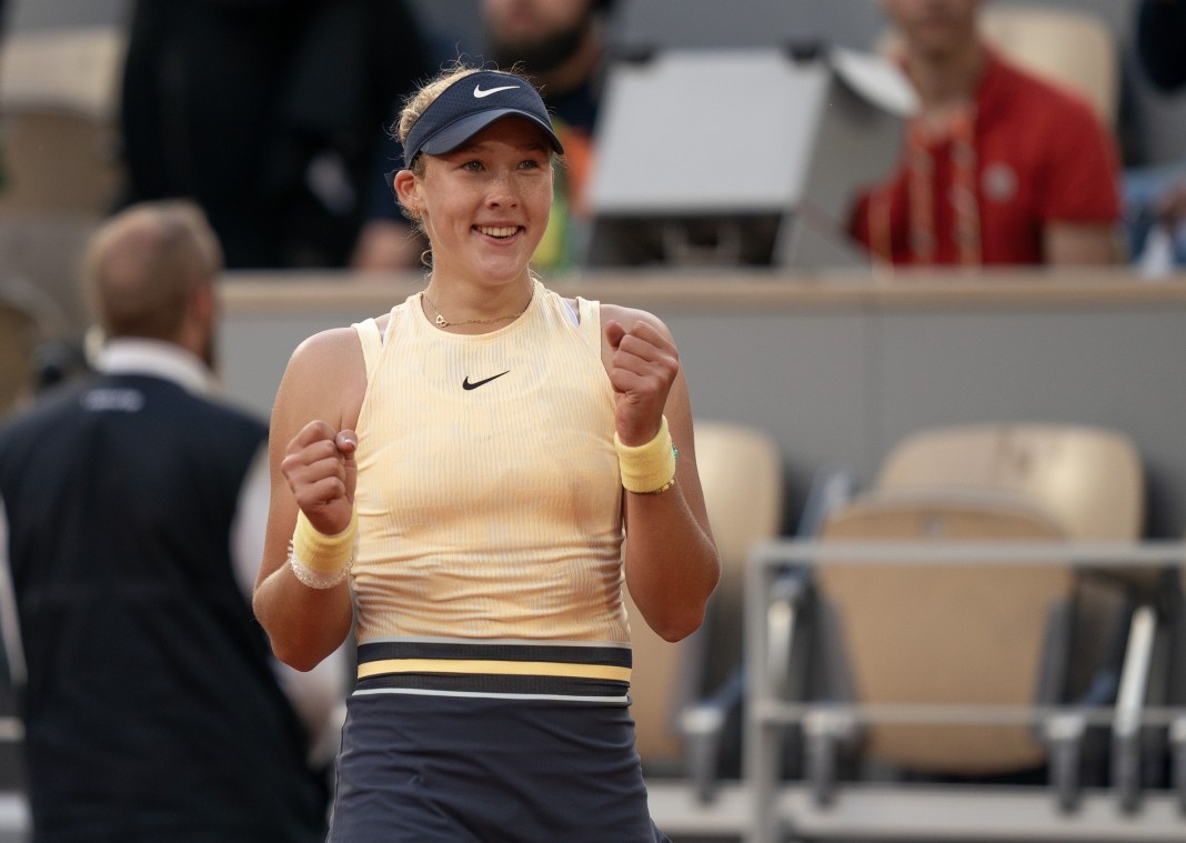 Mirra Andreeva celebrates a huge win over Aryna Sabalenka in the French Open quarterfinals.