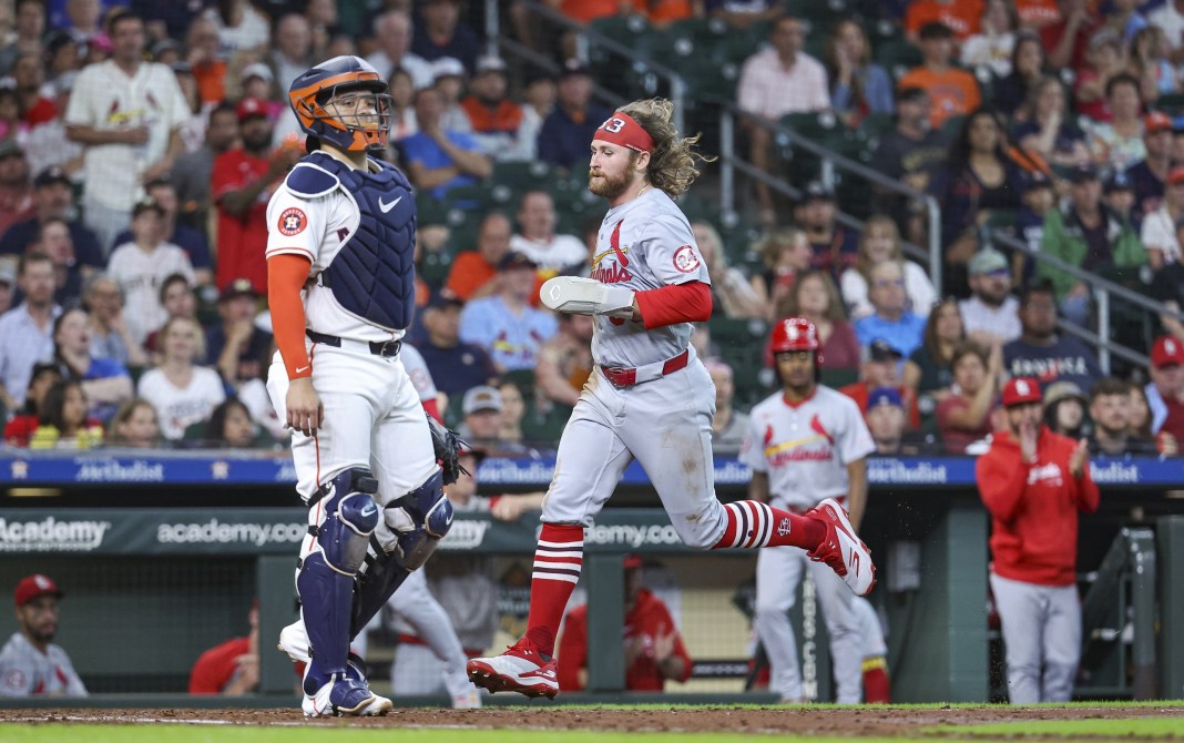 brendan donovan scores a run for the cardinals