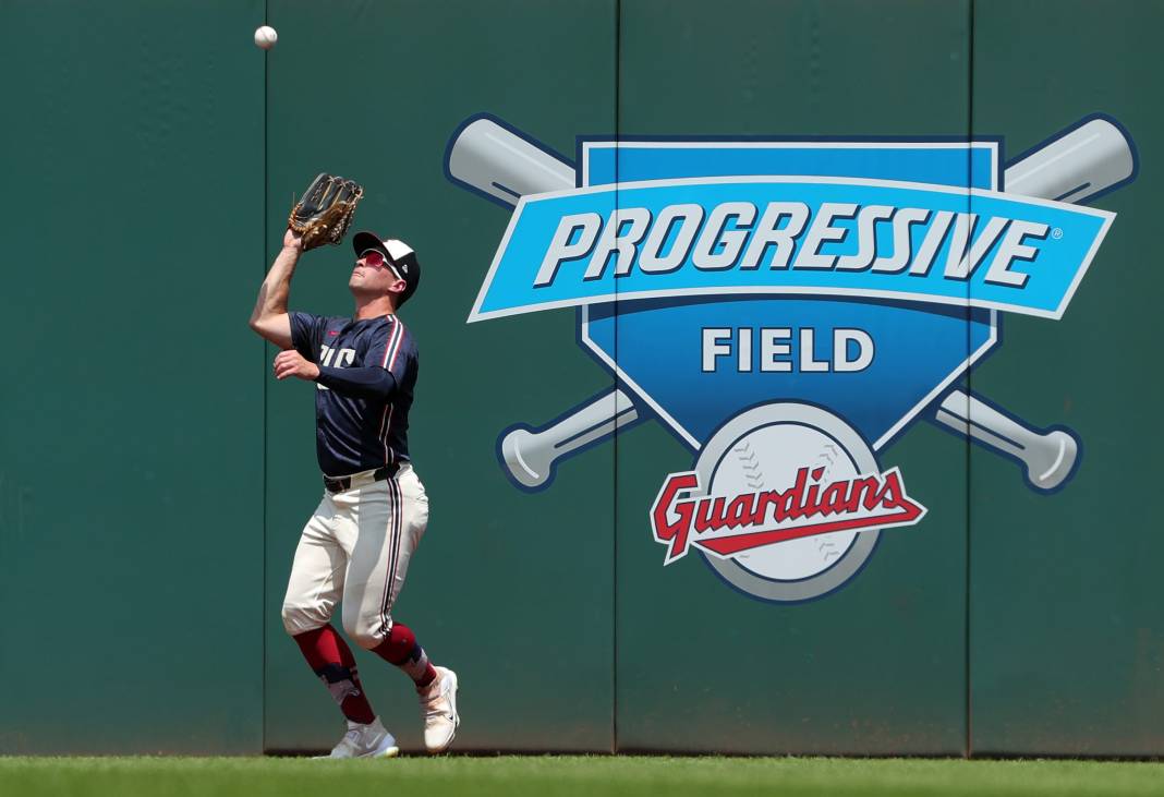 Cleveland Guardians right fielder Will Brennan gets under a fly ball during the second inning of an MLB game at Progressive Field.