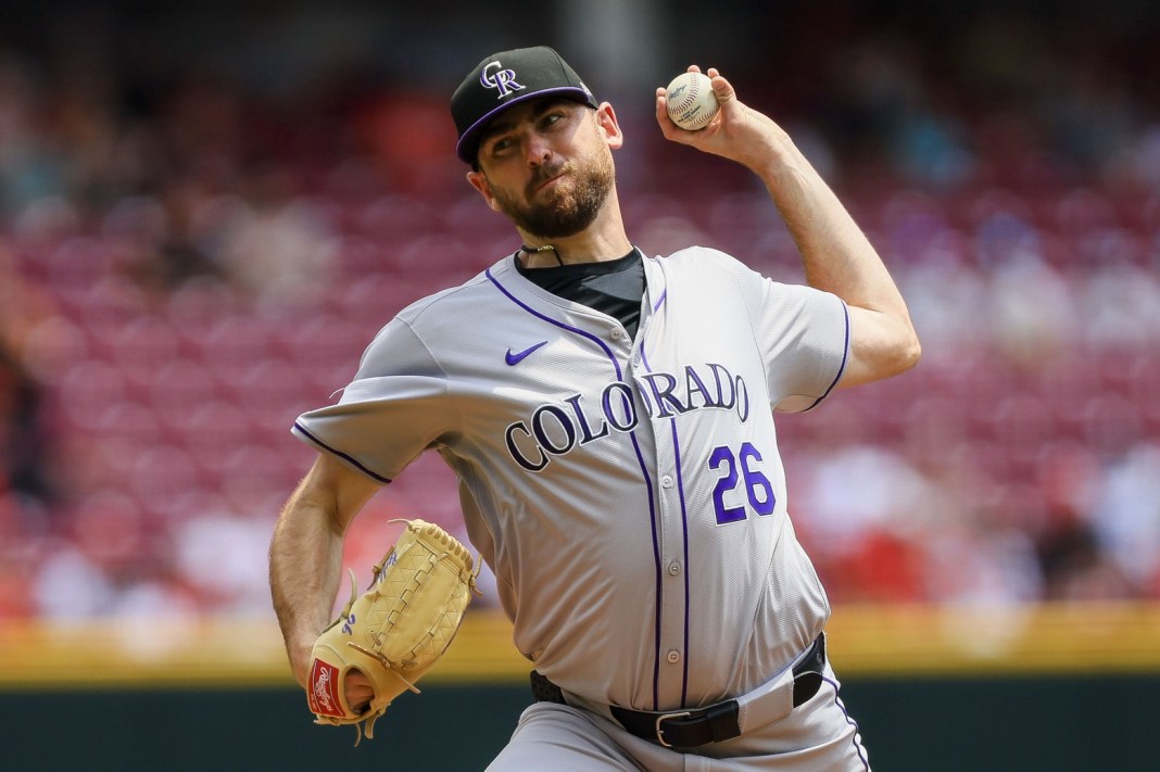 Colorado Rockies starting pitcher Austin Gomber (26) pitches against the Cincinnati Reds in the first inning at Great American Ball Park