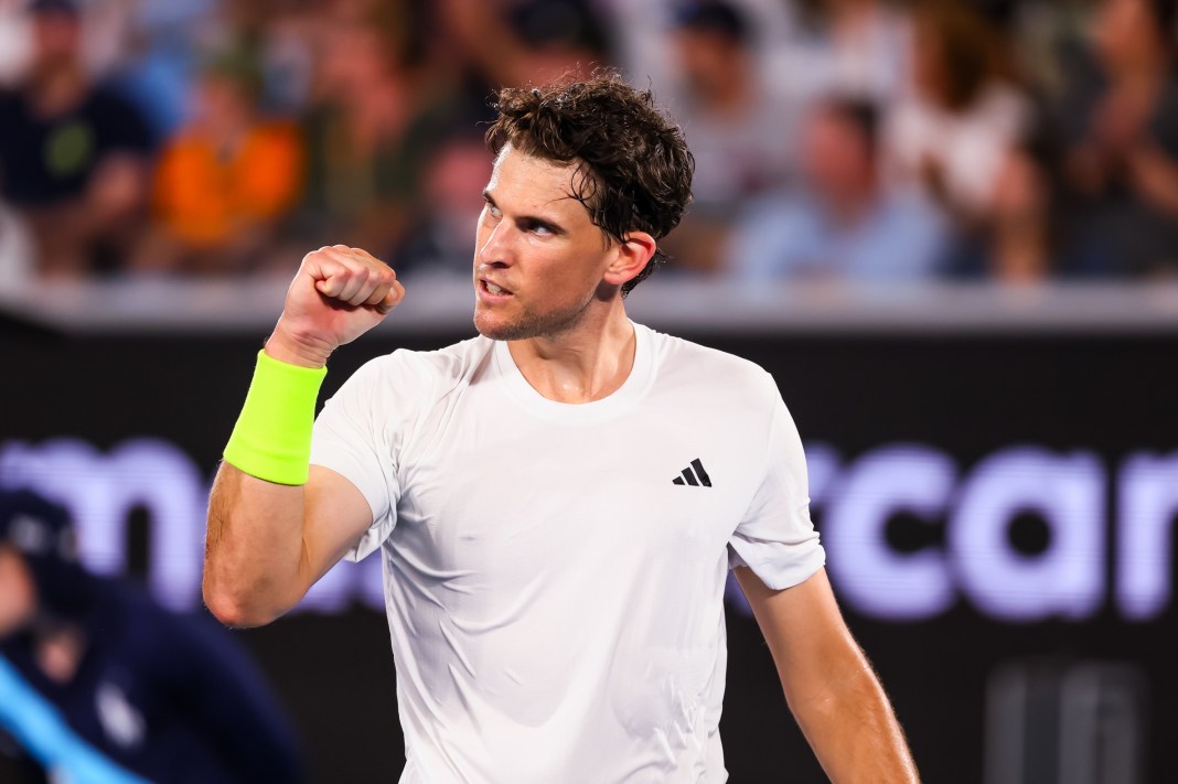 Dominic Thiem wins a point against Felix Auger Aliassime at the 2024 Australian Open.